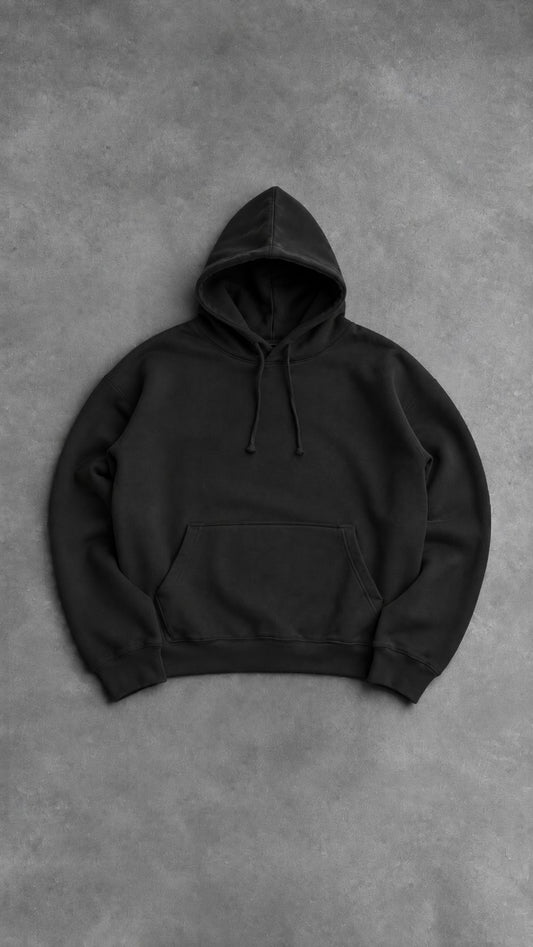 Black DRP Essential hoodie laid flat